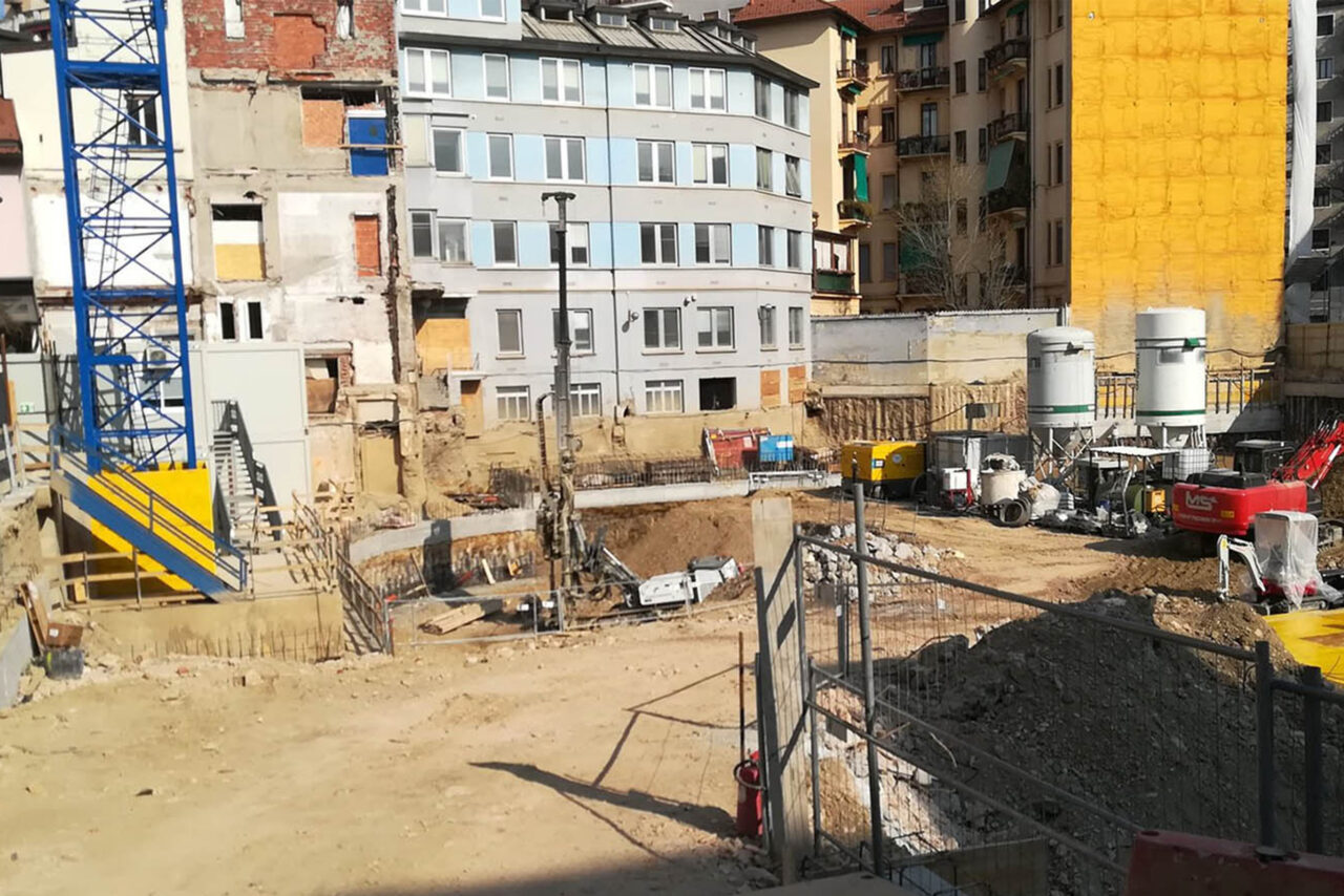 Construction site top down excavation technique Garofalo Paisiello residential complex in Milan, Italy